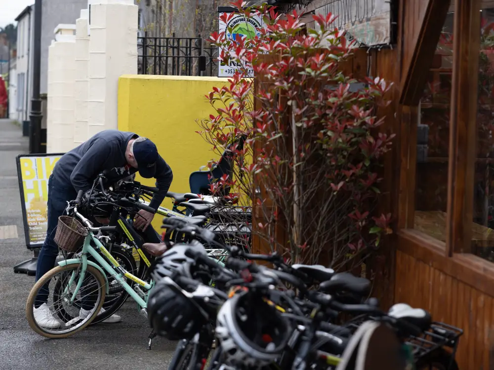 Person focusing on safety of bike following safety protocols